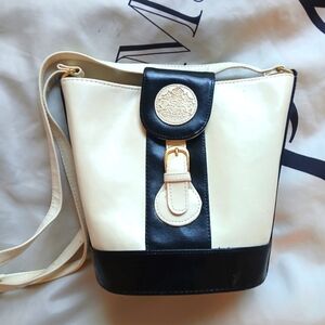 Elegant Vintage 1970s Bagattique Black and Cream Women's Bag
